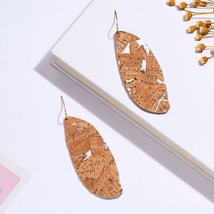 boutique Jewelry - Brand new!!!! Cork/faux leather feather earrings boutique Jewelry - Brand new!!!! Cork/faux leather feather earrings